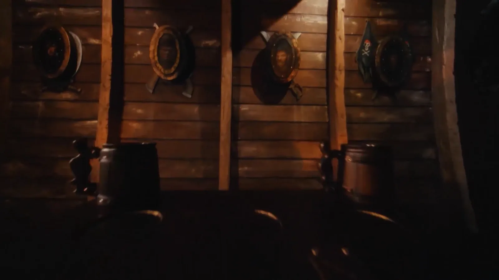 Cannons and barrels on the gun deck in Pirates